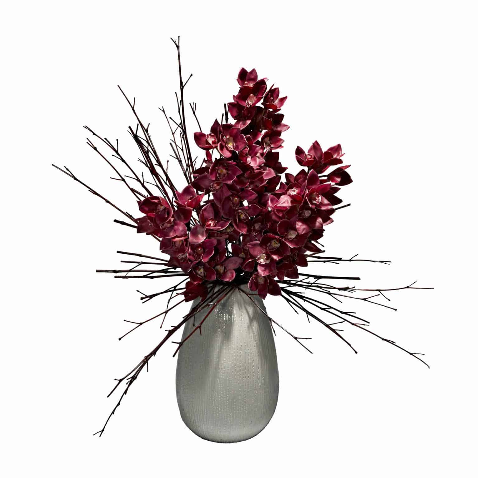 You'll love our minimalistic chic mauve silk flower cymbidium orchid in a white eggplant shaped ceramic vase. Effortless luxury artificial orchid stems.