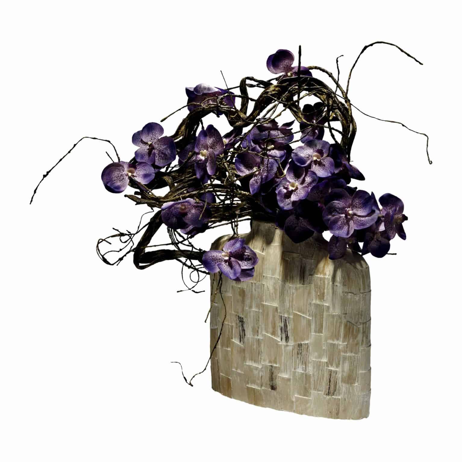 Buy and bring the woodland home with our distinctively wild woodland vanda silk orchid arrangement. With flax branches & blooming artificial flowers.