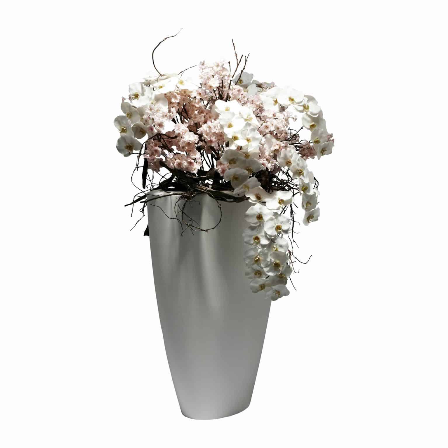 Buy our free standing floor arrangement of premium artificial flower blossom and fine silk pure white phalaenopsis orchid cascading in natural flow.