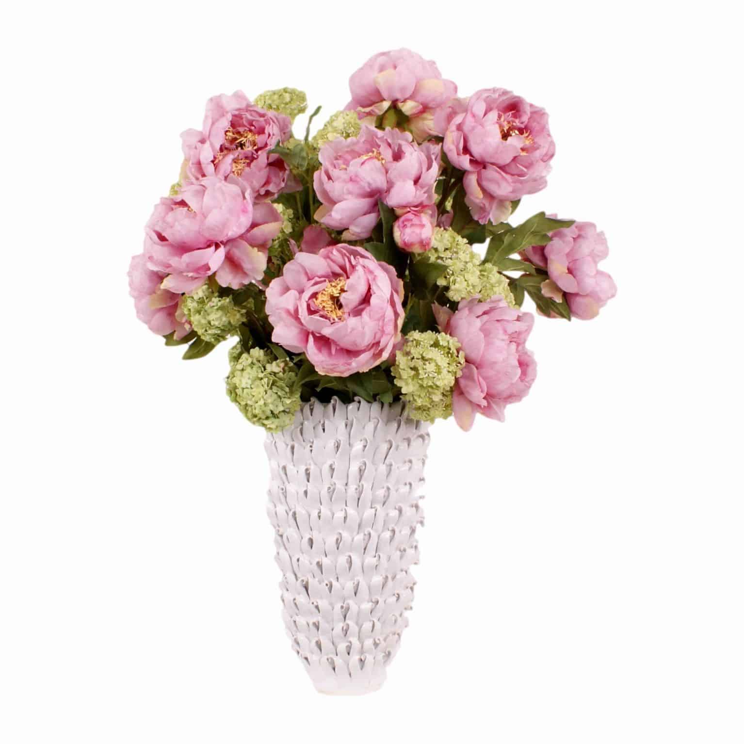 Shop for bloomed silk flower soft pink peonies with ruffled petals & flawless pollen. Mixed with artificial green guelder rose in a ceramic seashell vase.