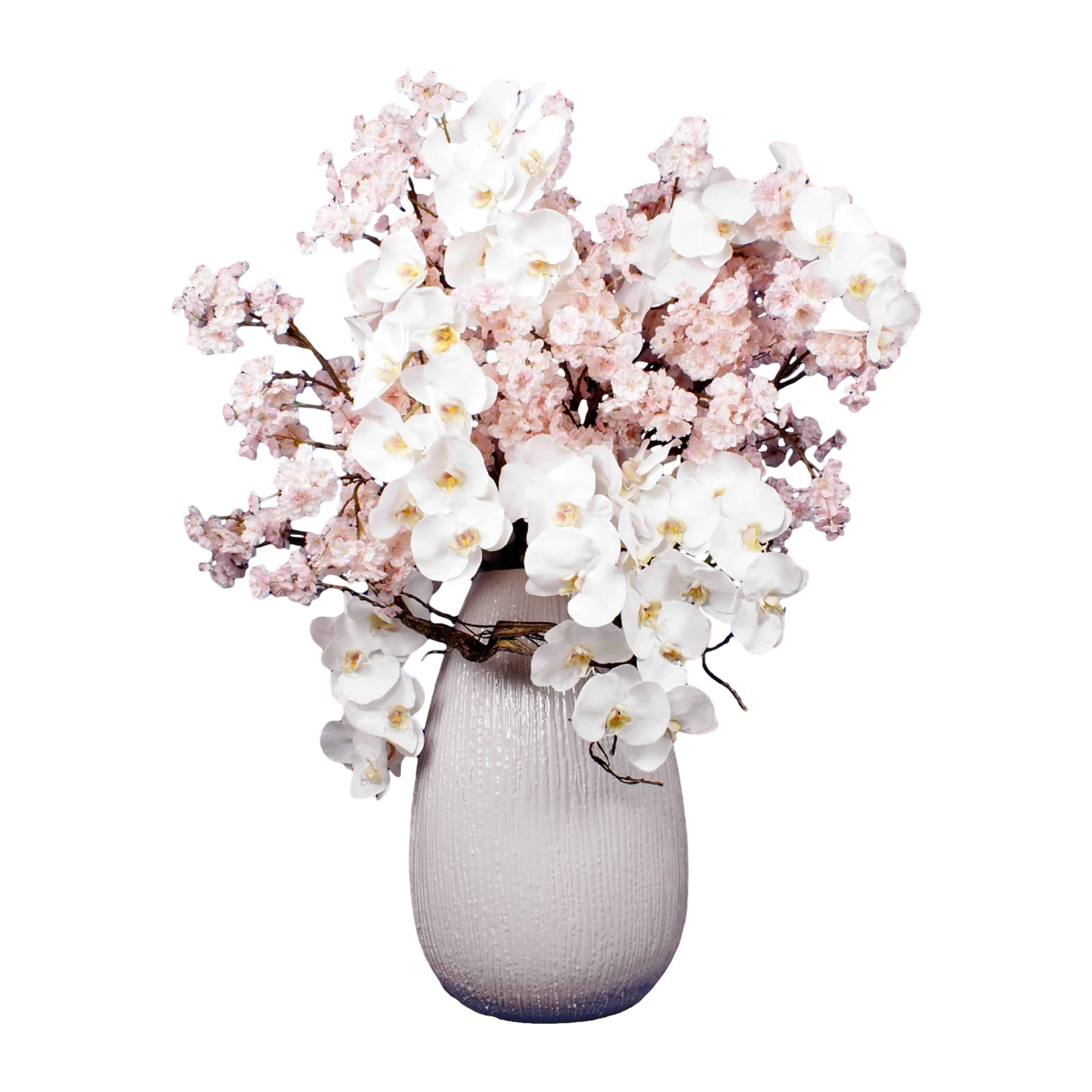 Buy our beautiful blossom and orchid faux arrangement. Clean and elegant