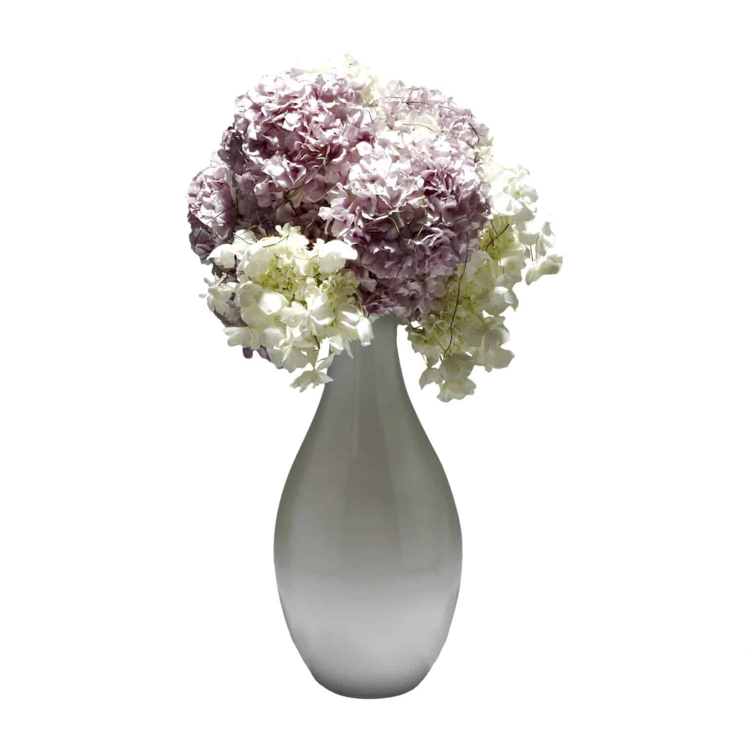 Shop for our beautiful pink & white butterfly hydrangea arrangement. Designed in dome and arranged in a white vase for a chic modern look.