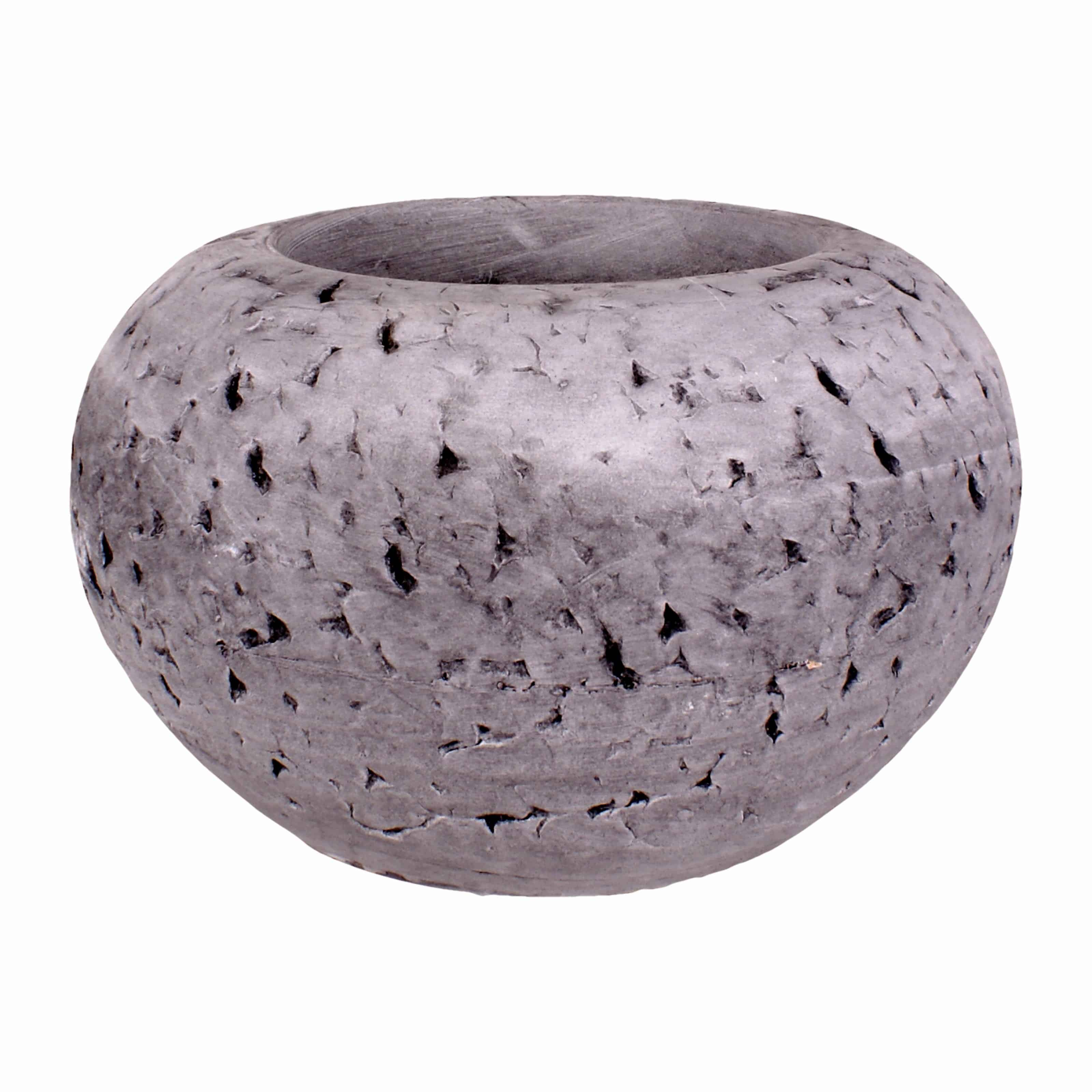 Buy our hand made unique design light grey cranium planter pot. A modern style with interesting grooves to add a chic touch to your flowers and plants.