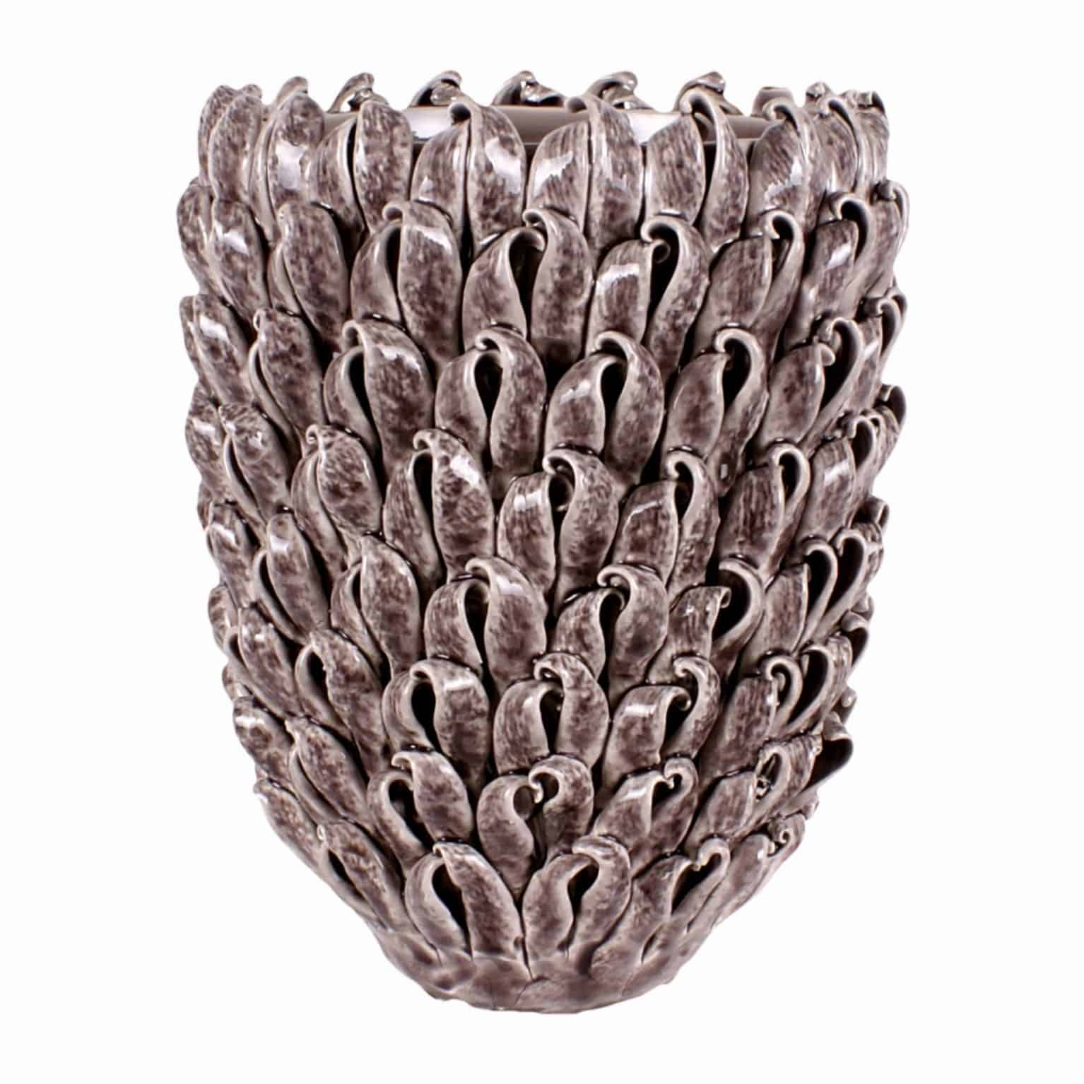 Buy our distinctive hand made seashell effect ceramic flower vase. Strong enough for large flower arrangements and plants. A modern showpiece for any home.