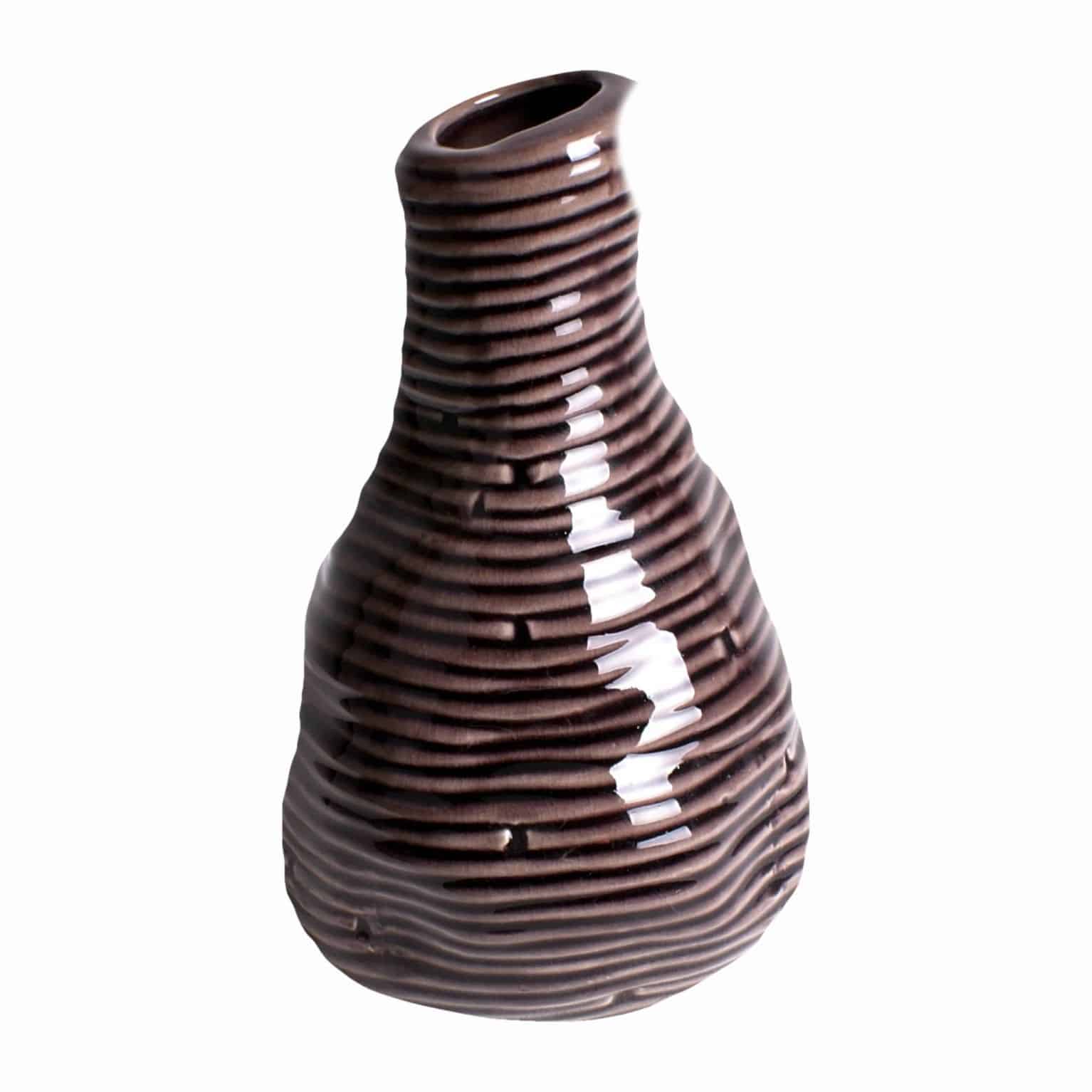 Shop for our handmade glazed vase. A distinctive aubergine colour and natural unevenness