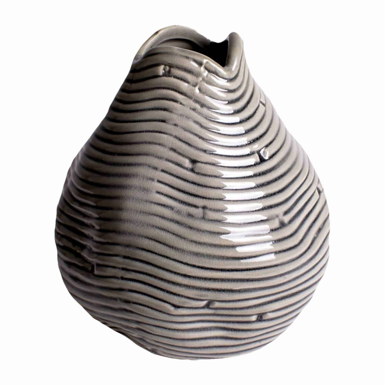 Buy our unique teardrop handmade vase. A decorative grey design creating differing shades Perfect for a few silk flower stems or branches for stylish decor.