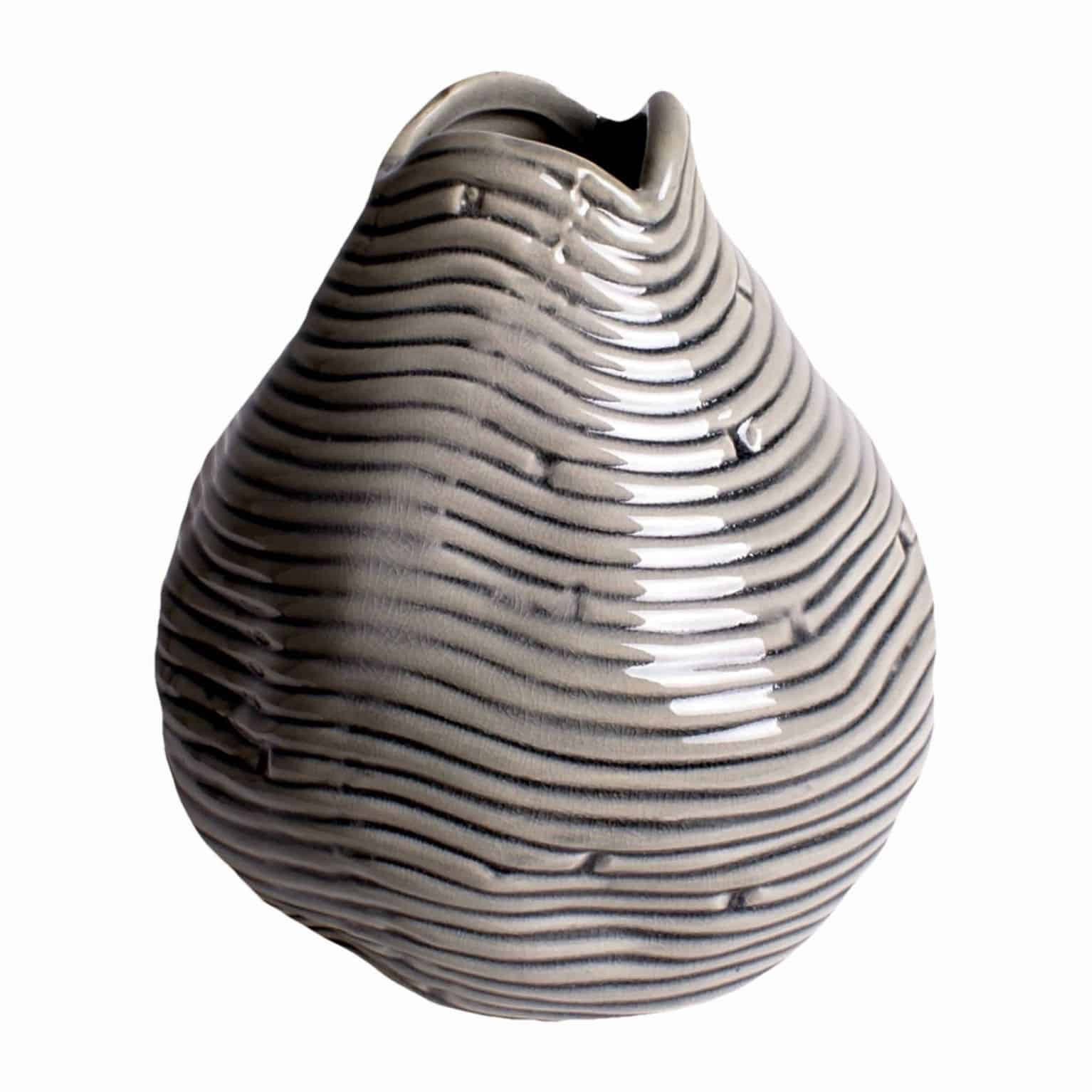 Buy our unique teardrop handmade vase. A decorative grey design creating differing shades Perfect for a few silk flower stems or branches for stylish decor.